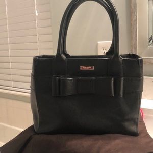 Black Kate Spade purse with bow